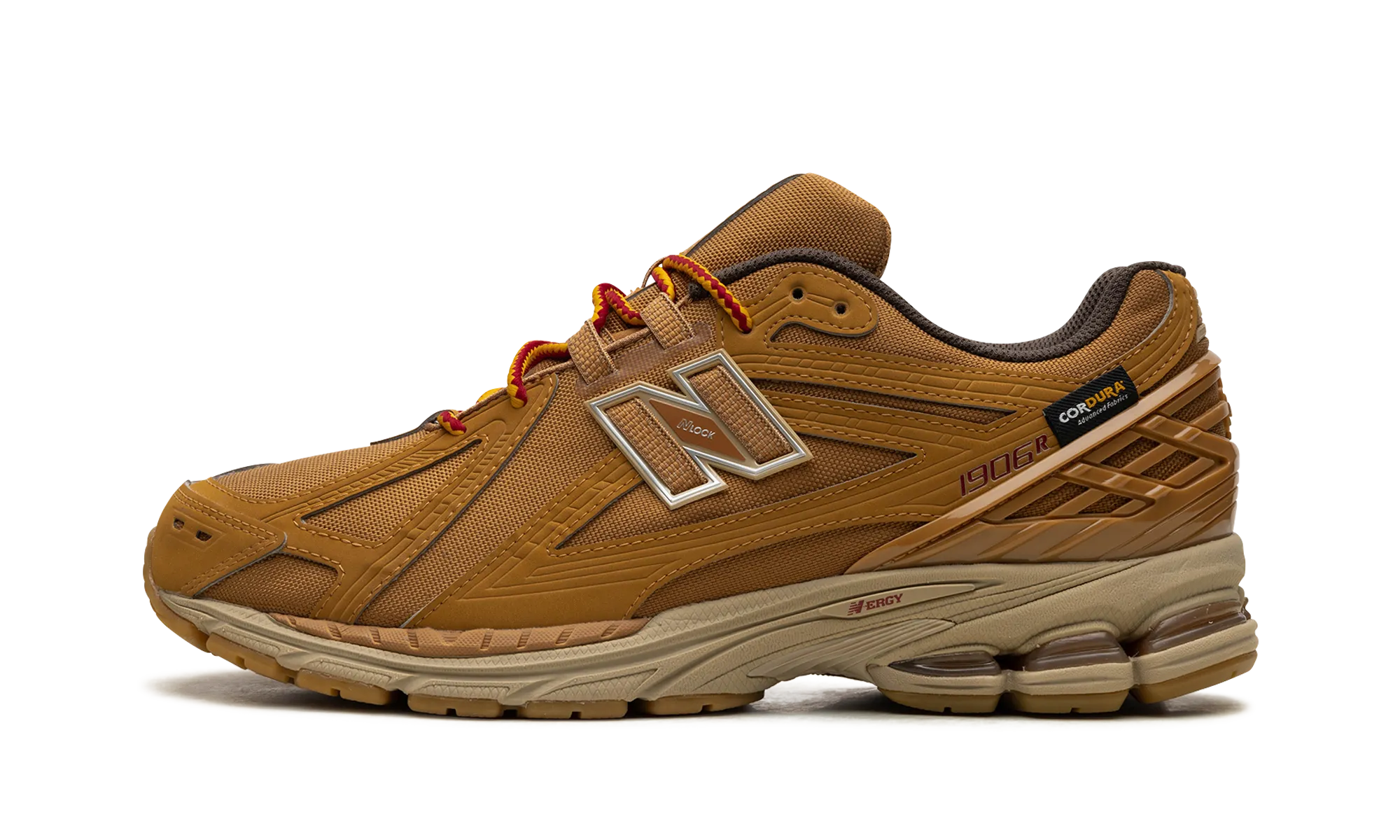 1906R "Cordura Pocket - Tobacco" running in a ravine area shoes Muddy running grip