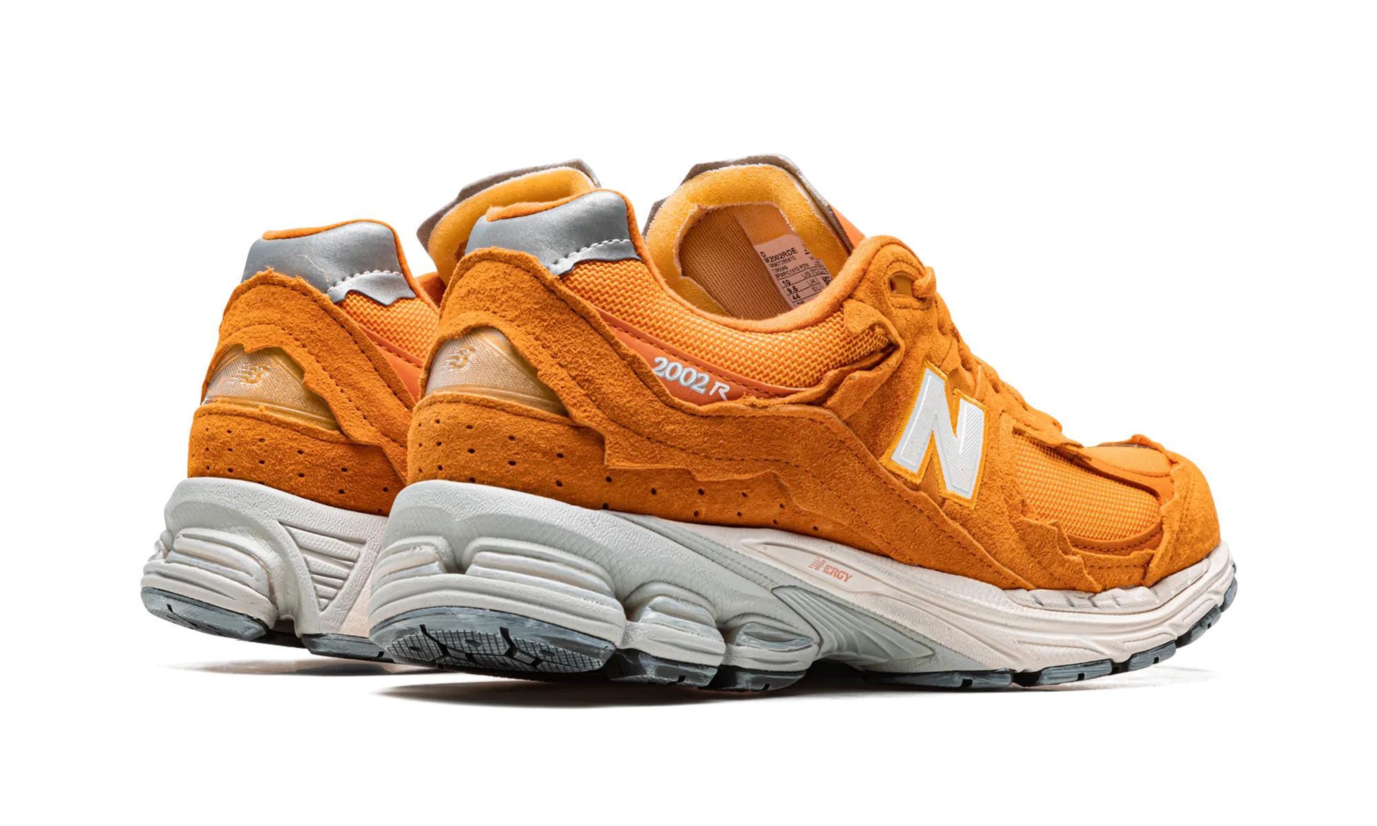 2002R "Protection Pack - Vintage Orange" running in a mud run shoes