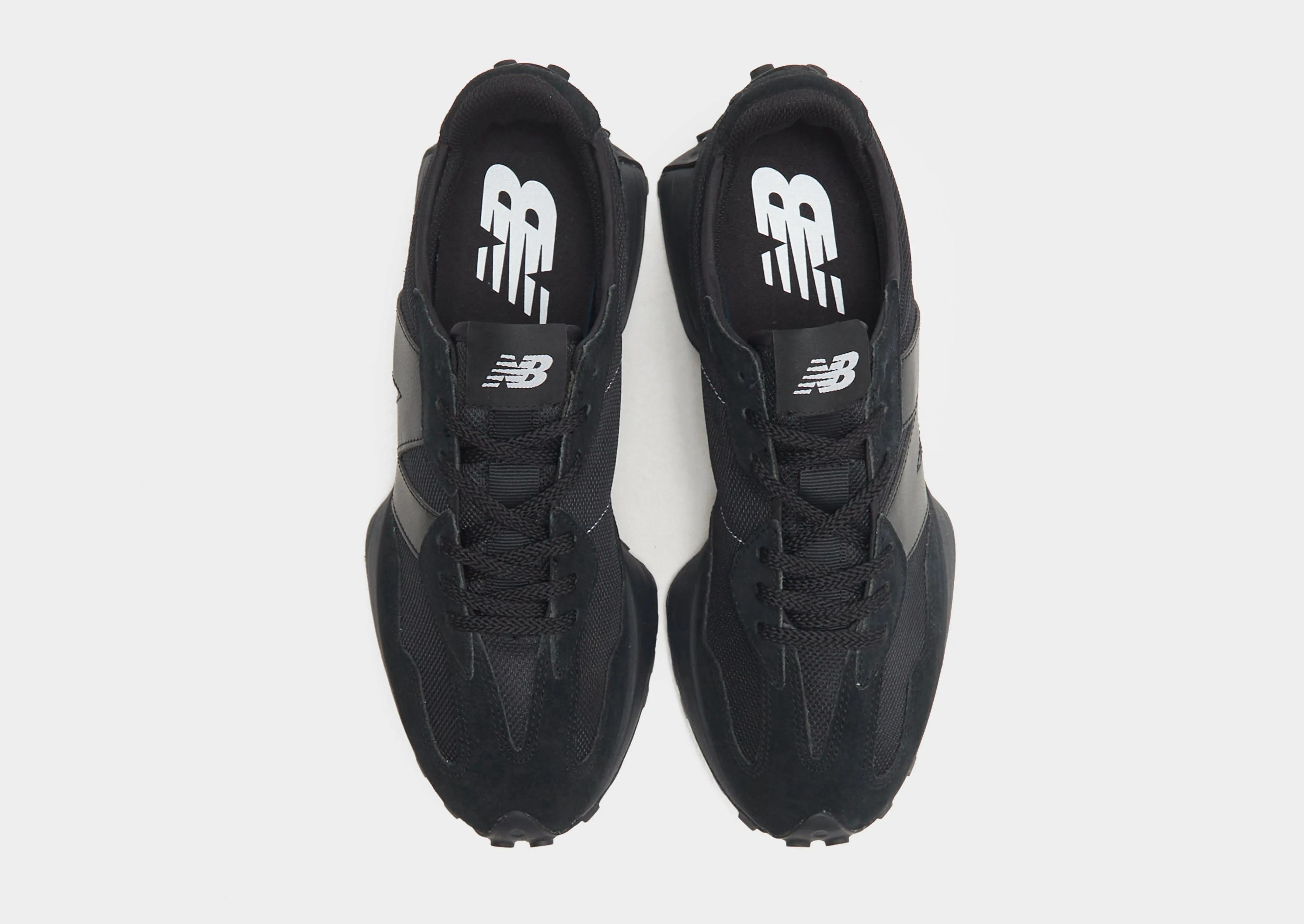 327 running in a tram station area shoes wide widths