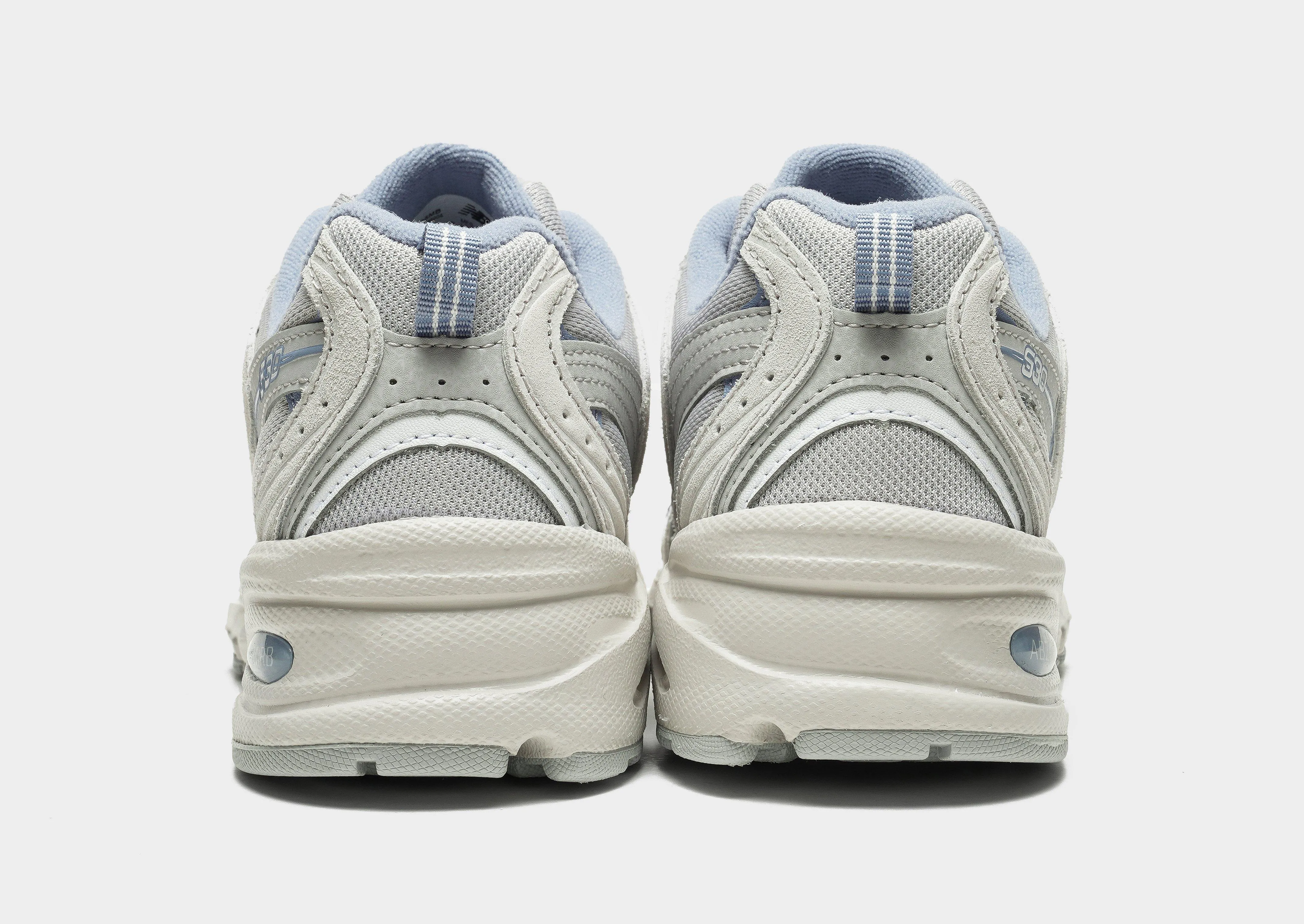 college - team - themed running shoes 530 Women's