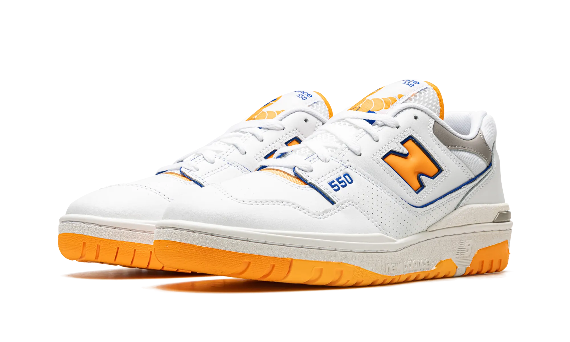 550 "Lakers Pack- Vibrant Orange" running in a bluff area shoes
