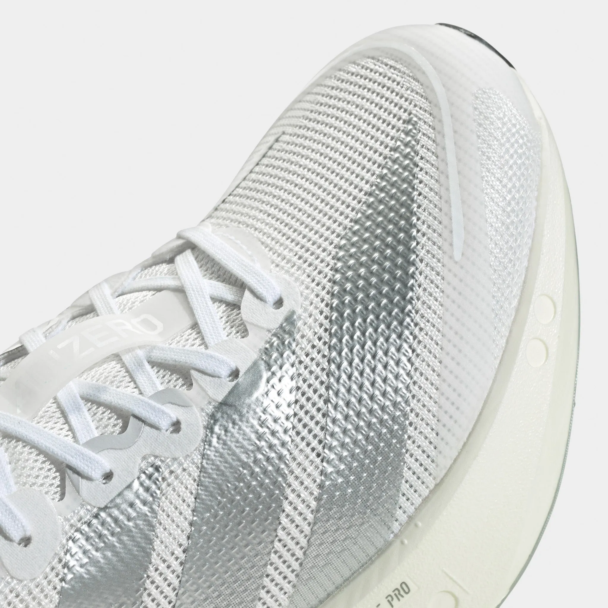 Enhanced Grip Pattern Step Forward adidas Women's Adizero Boston 13 White / Matte Silver - Dash Grey
