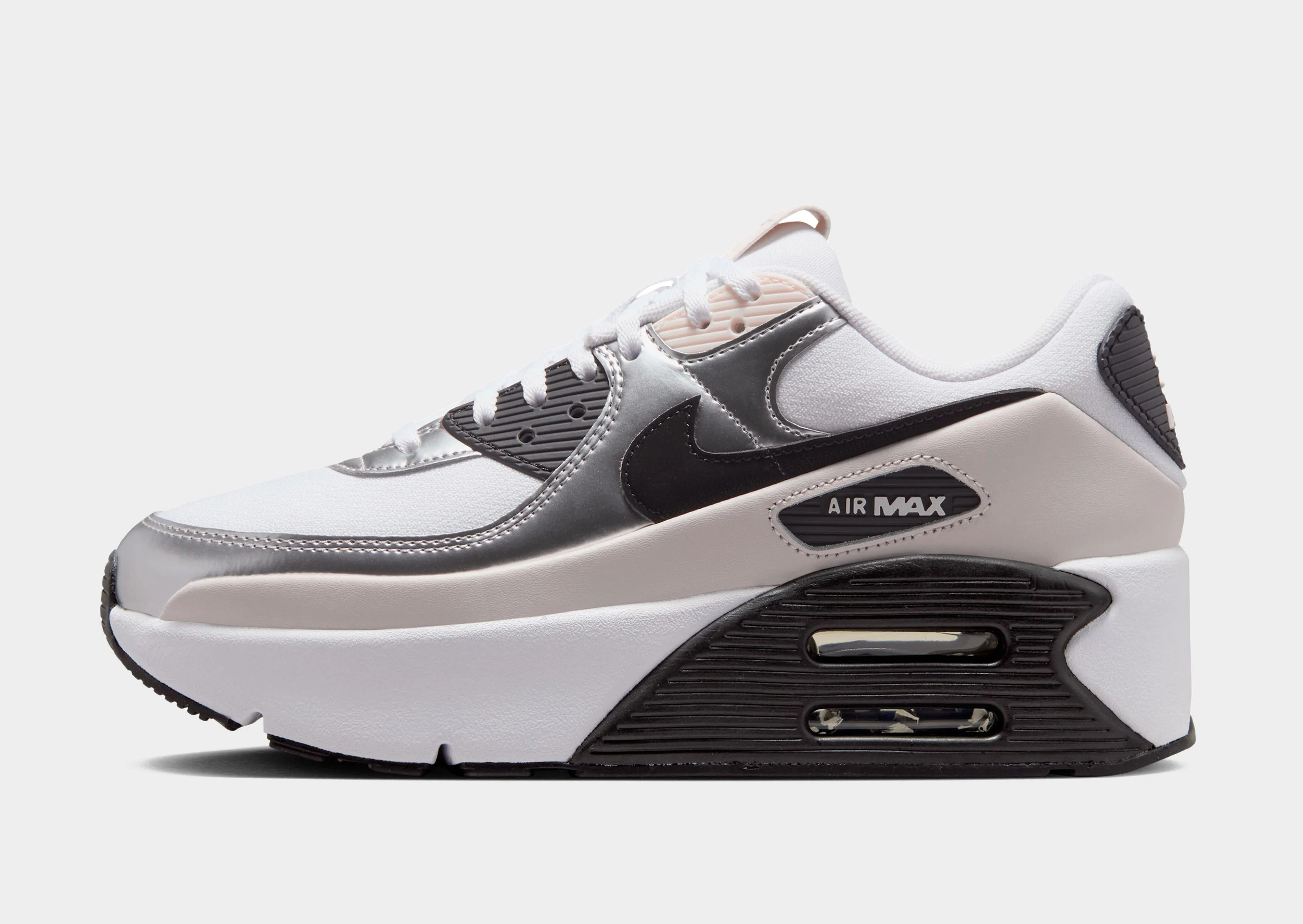Air Max 90 LV8 Women's sports lovers running with a hydration pack