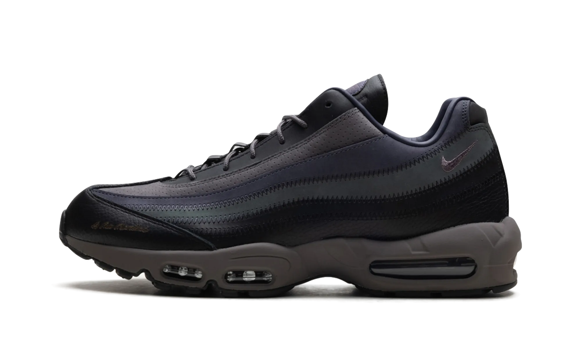 Air Max 95 "A Ma Mani??re - Hand Wash Cold" running in a racecourse