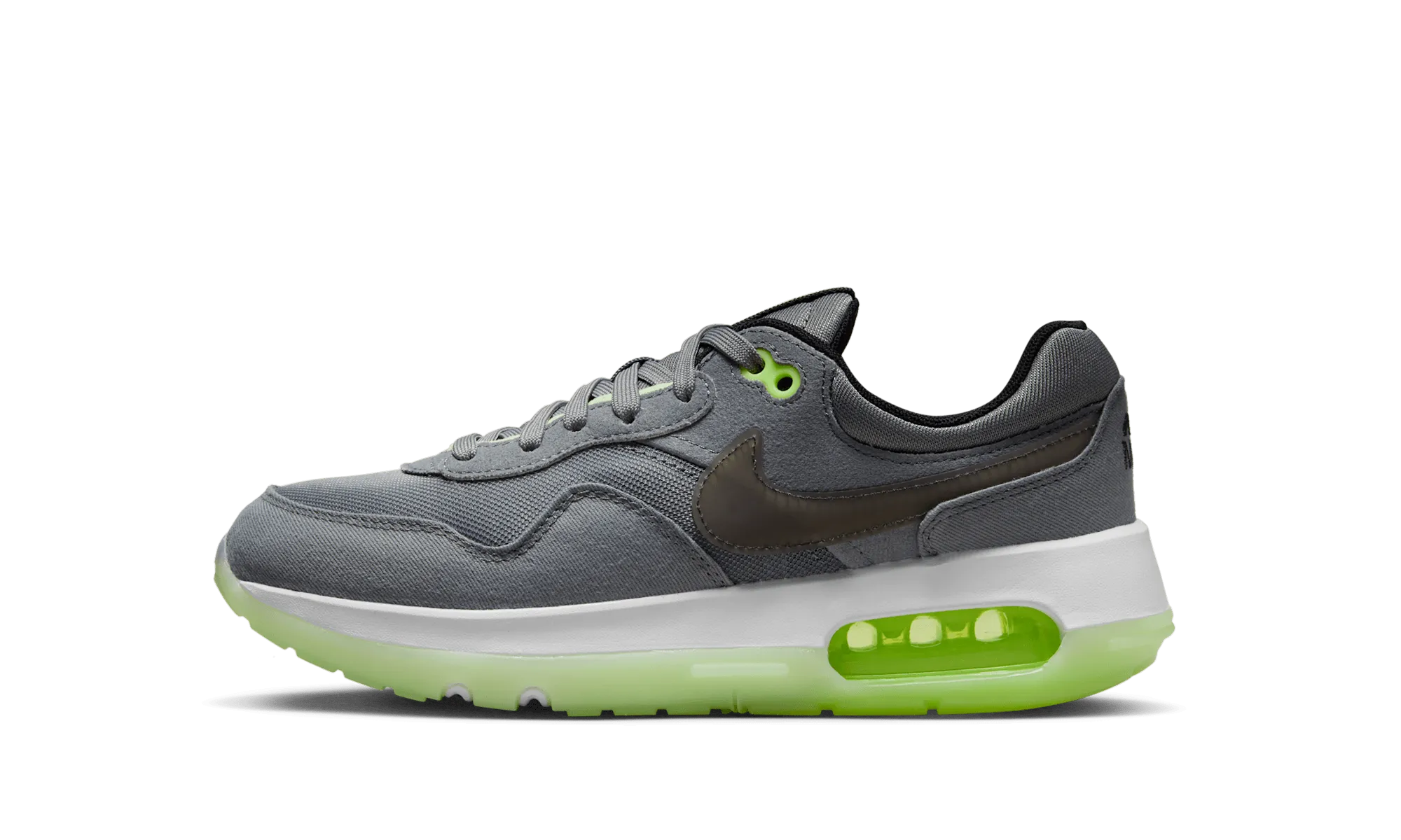 Air Max Motif GS "Smoke Grey Volt'" Agility Flow running in a train station area shoes