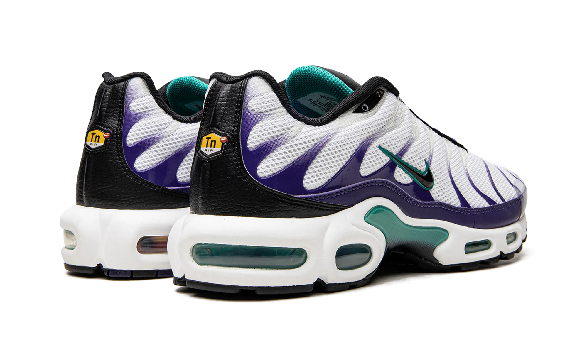 Air Max Plus "Grape" running in a suburban area shoes
