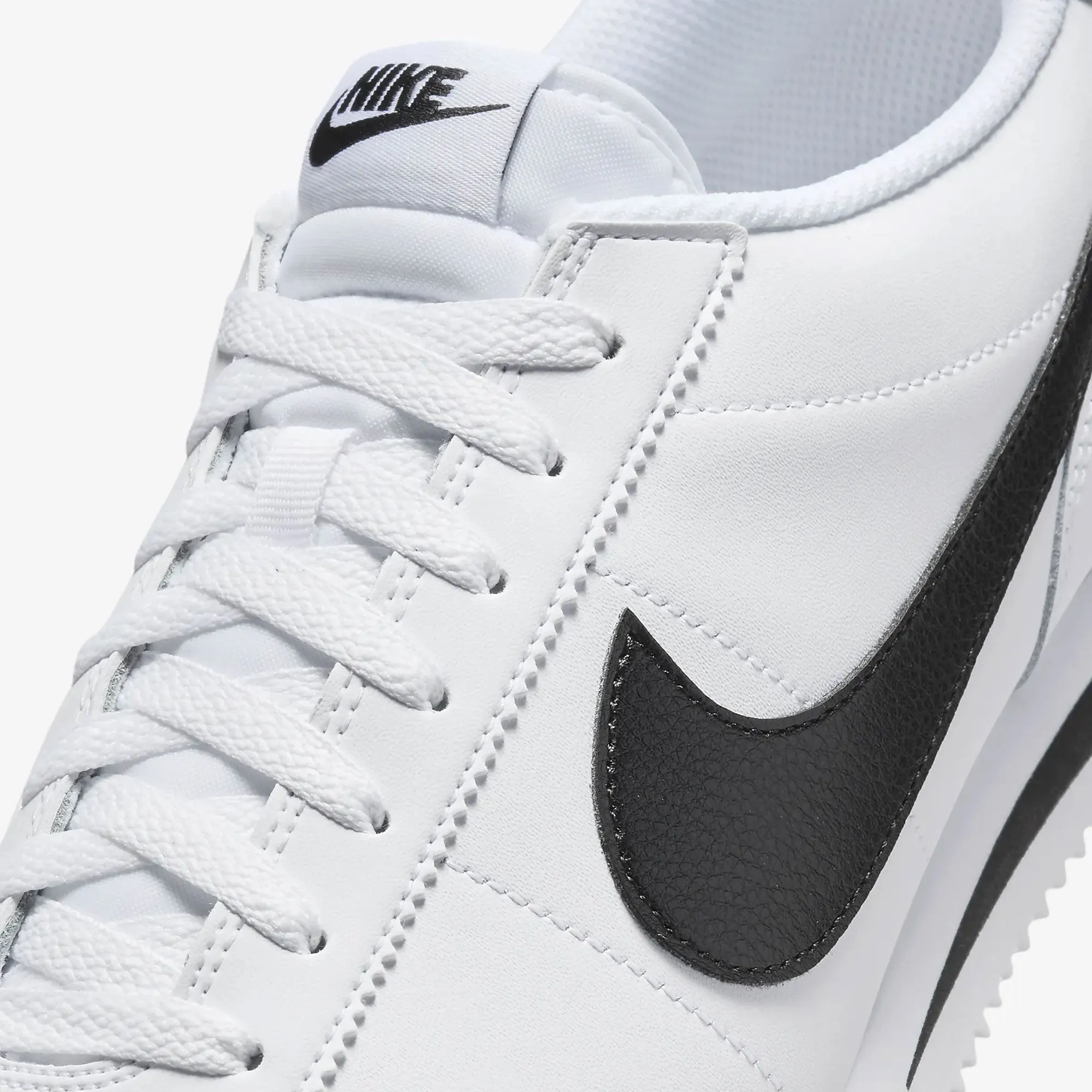 Reinforced Eyelets Upgraded flexibility NIKE | CORTEZ { WHITE/BLACK