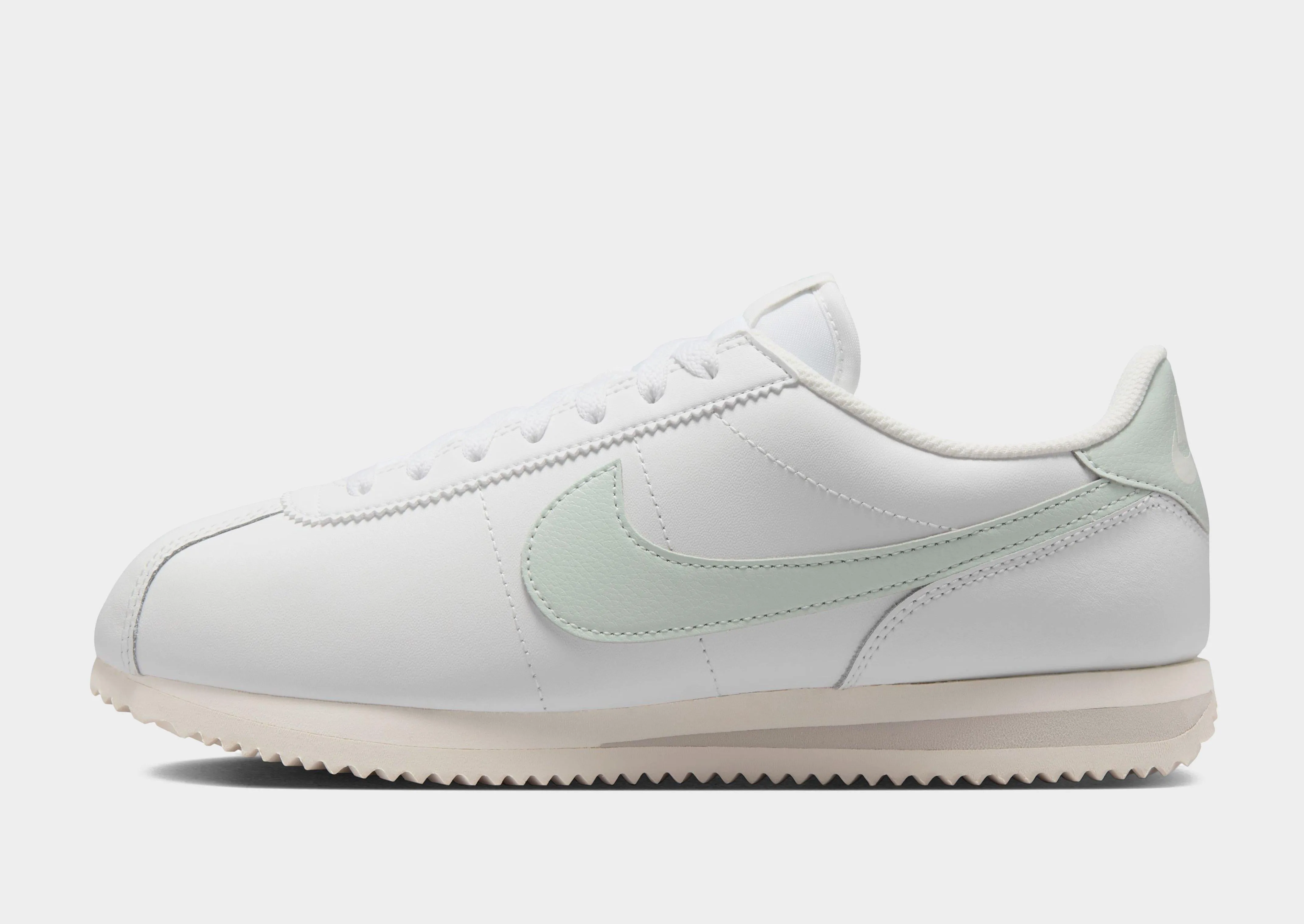 Cortez Leather Women's running on a dirt path