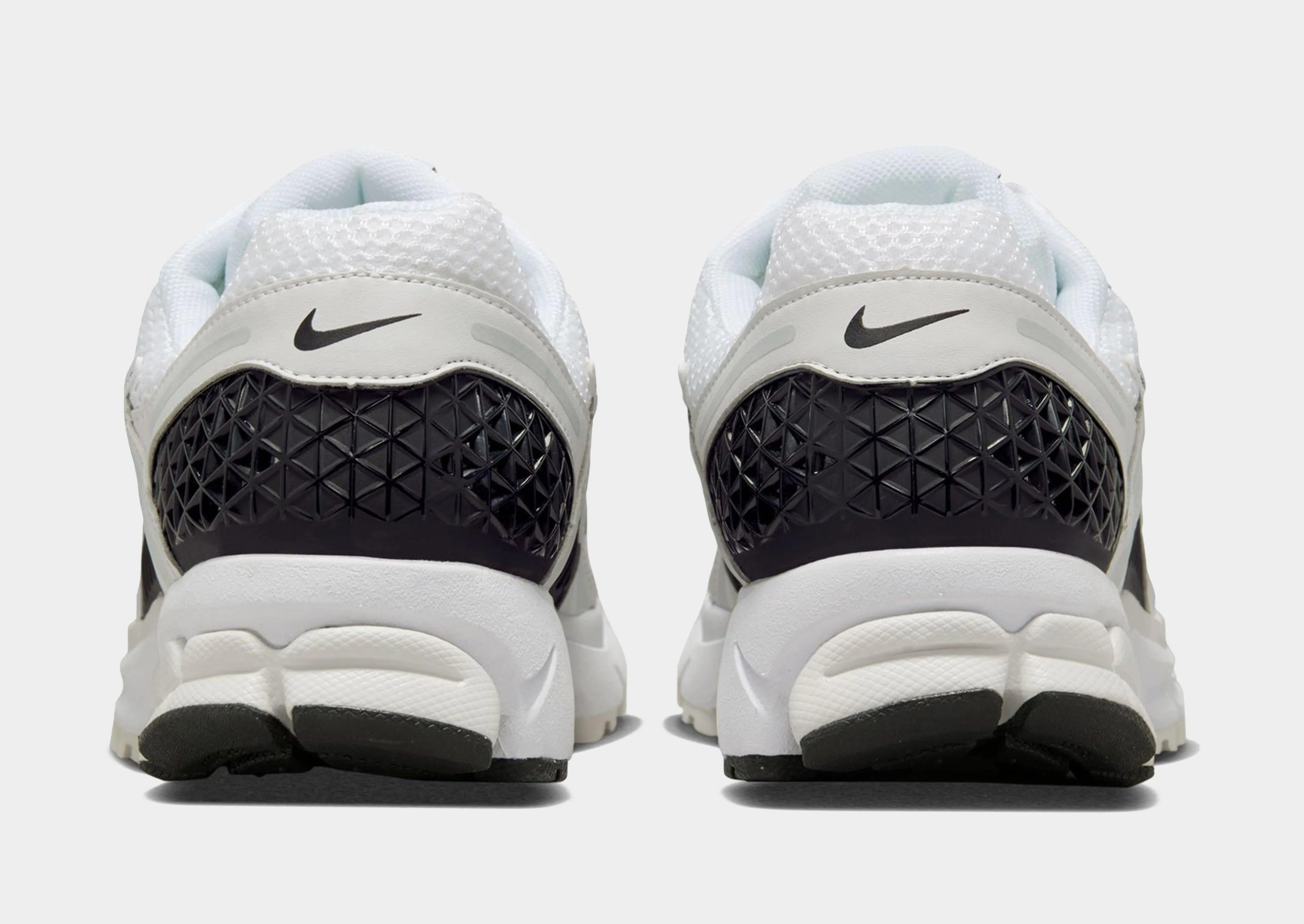 Zoom Vomero 5 running on asphalt shoes