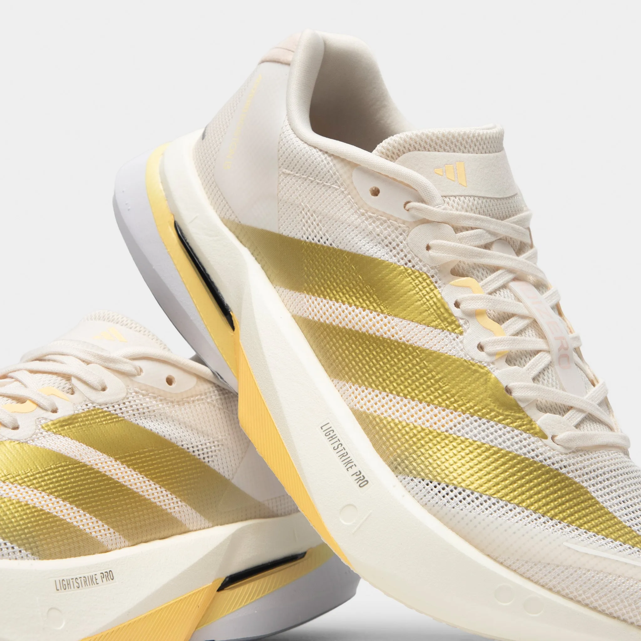 adidas Women's Adizero Boston 13 Chalk White / Gold Metallic - Orange Tint High   Top Style Thermal Regulating