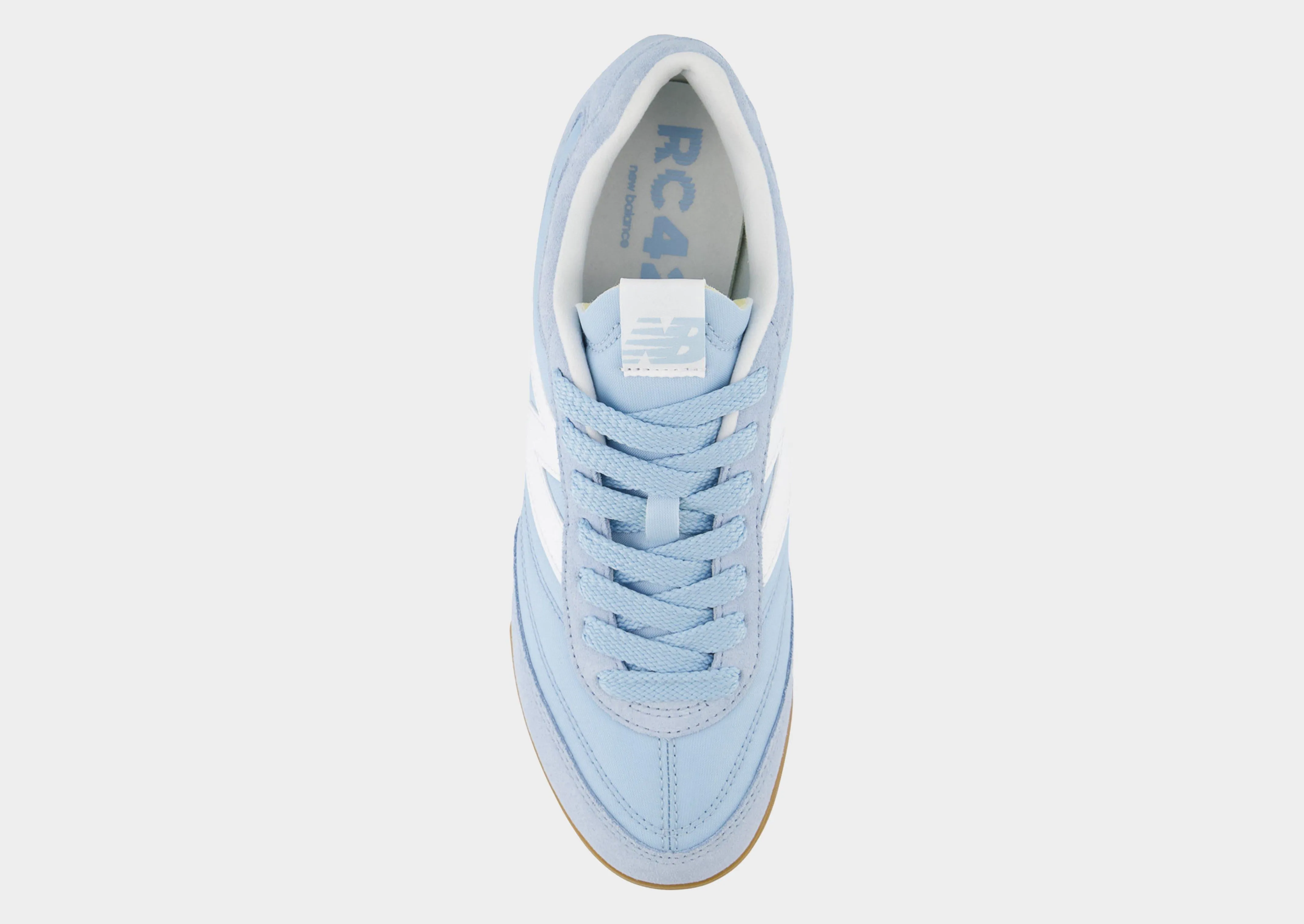 RC42 Women's Ventilated Upper running with a bandana