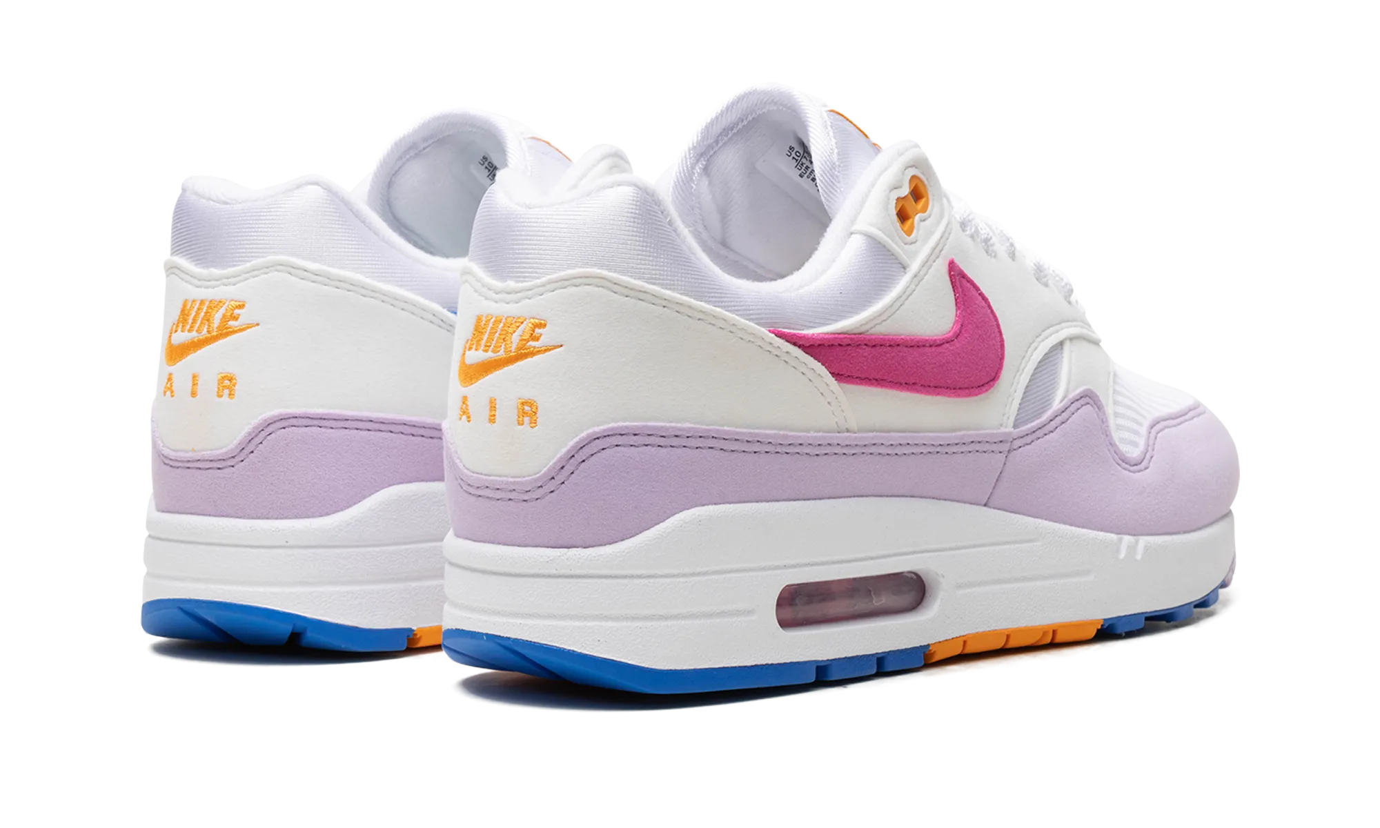 Air Max 1 '87 WMNS "Mismatched Swoosh" running in a duathlon