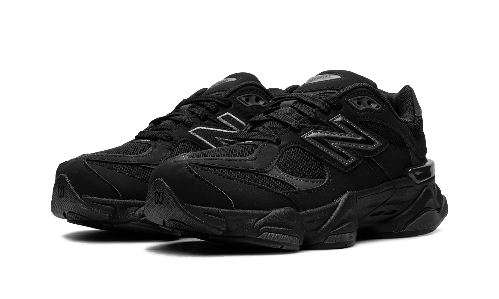 9060 GS "Black Cement" running with headphones