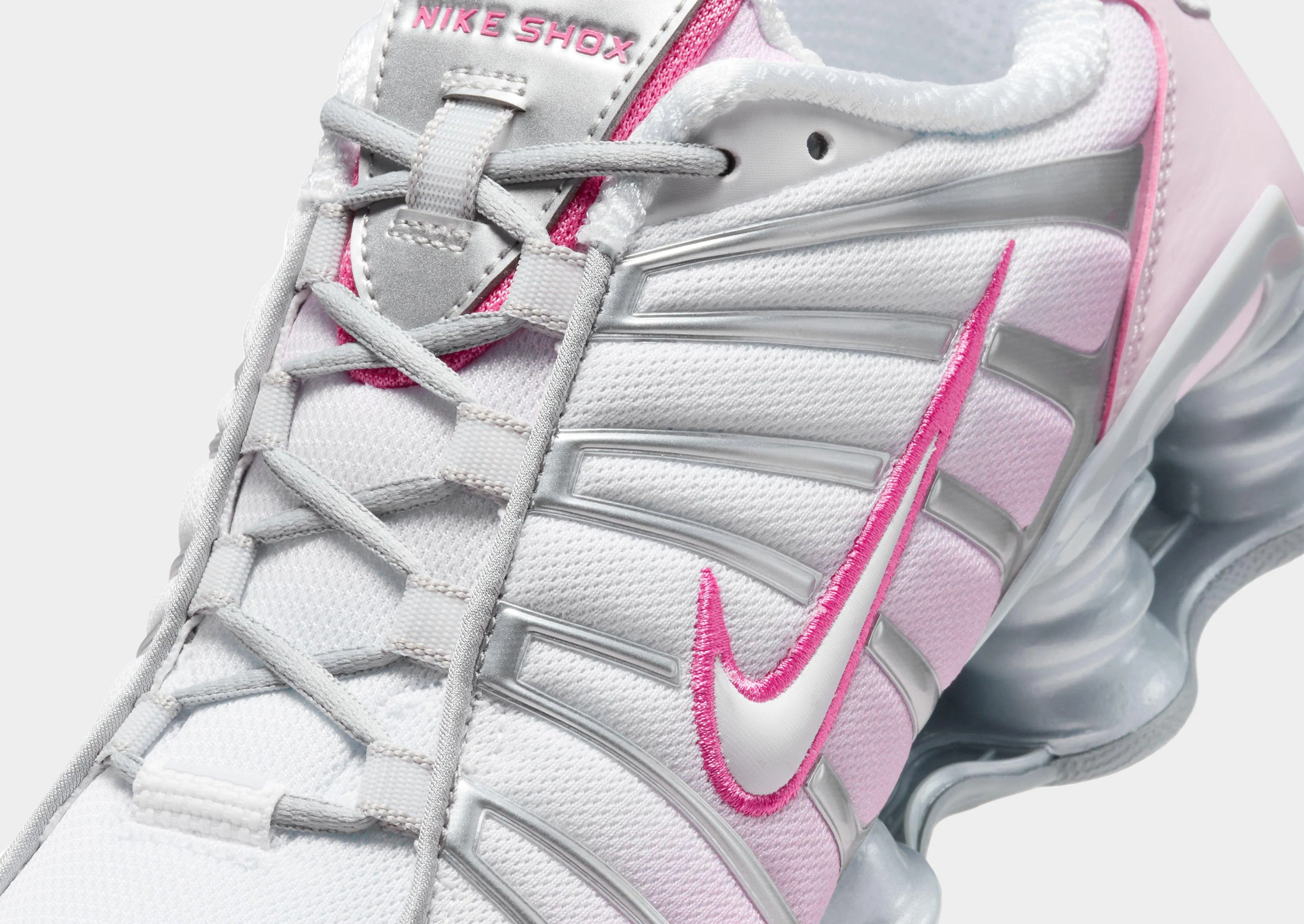 Shox TL Women's running on a dirt path