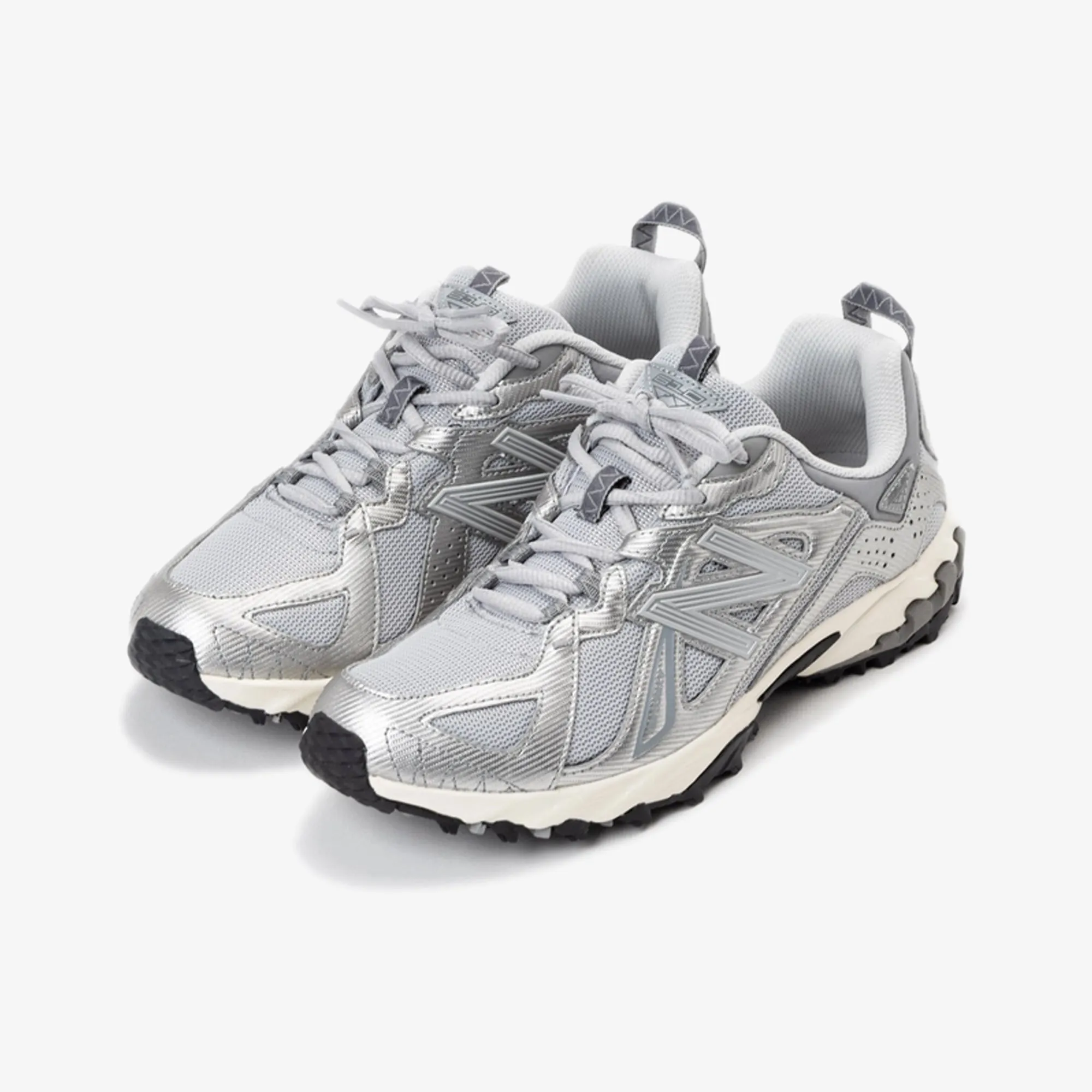 New Balance | 610T { GREY running with a running vest