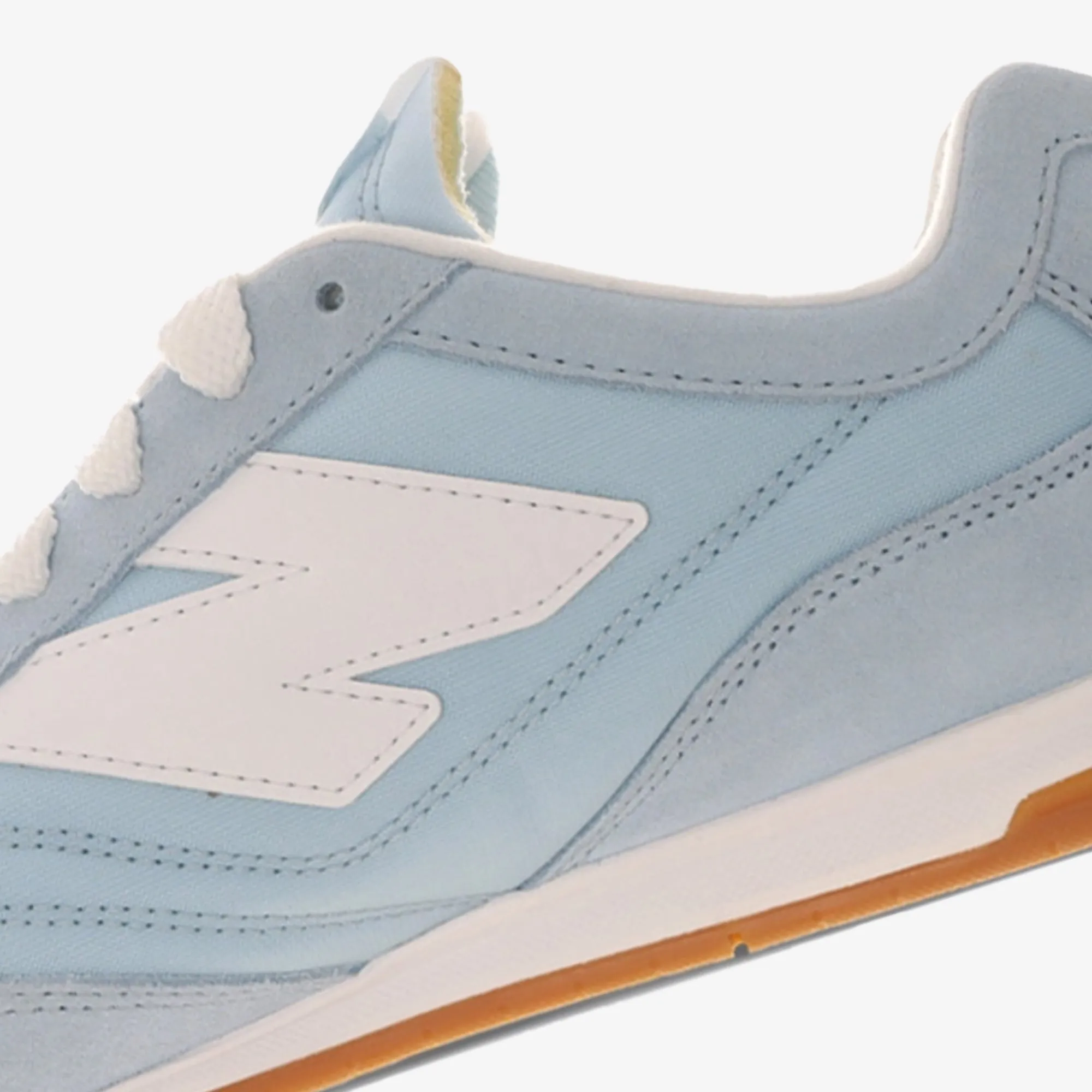New Balance | RC42 { BLUE/WHITE running in a crater area shoes Pro - grade