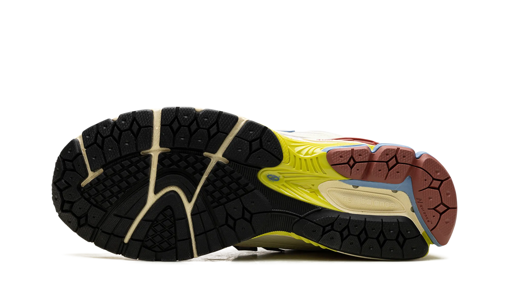 1906R "Dawn Glow/Tamarind" running in professional tracks shoes running in a tundra area shoes