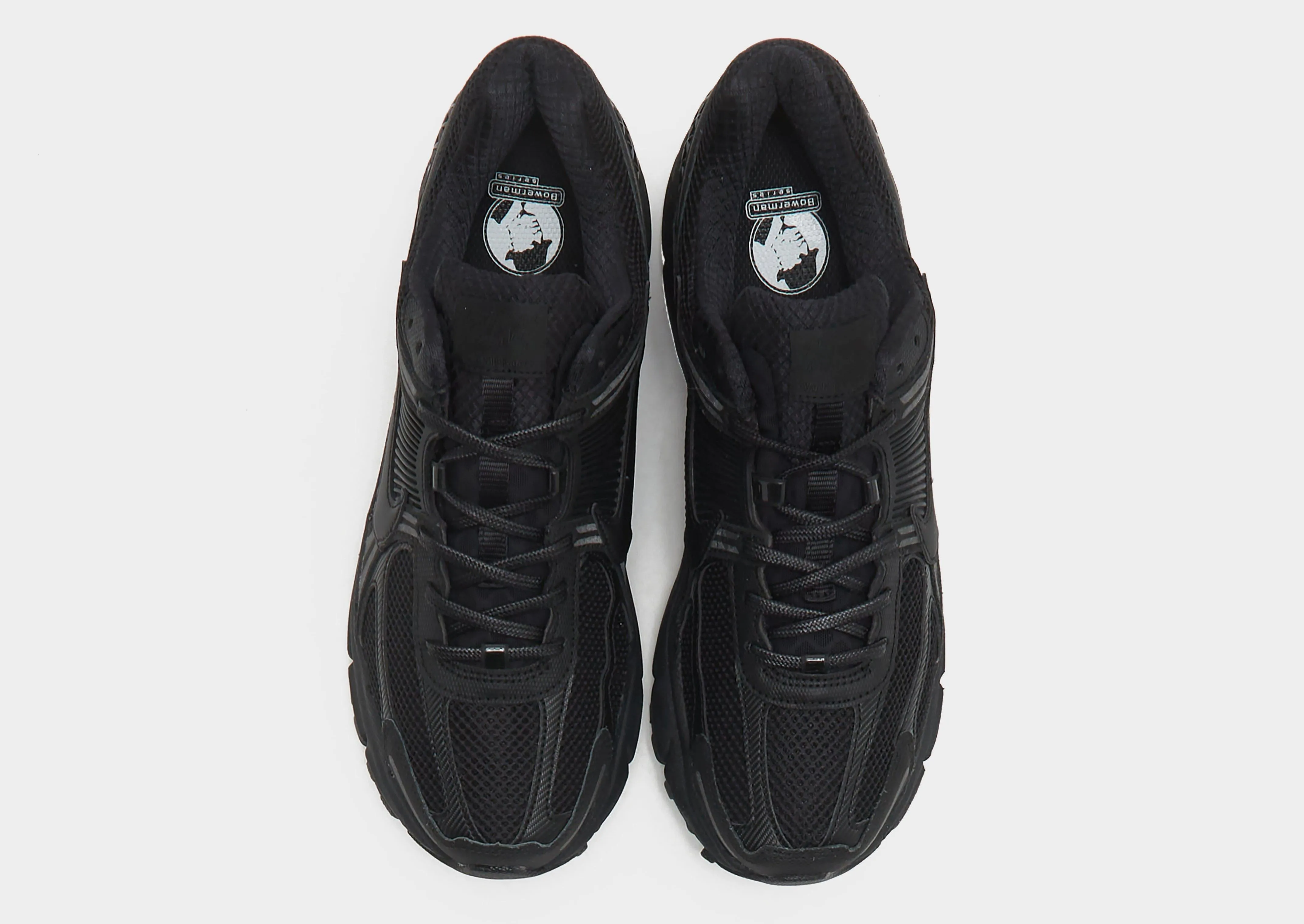 Zoom Vomero 5 Elastic Midsole running in a fitness center shoes