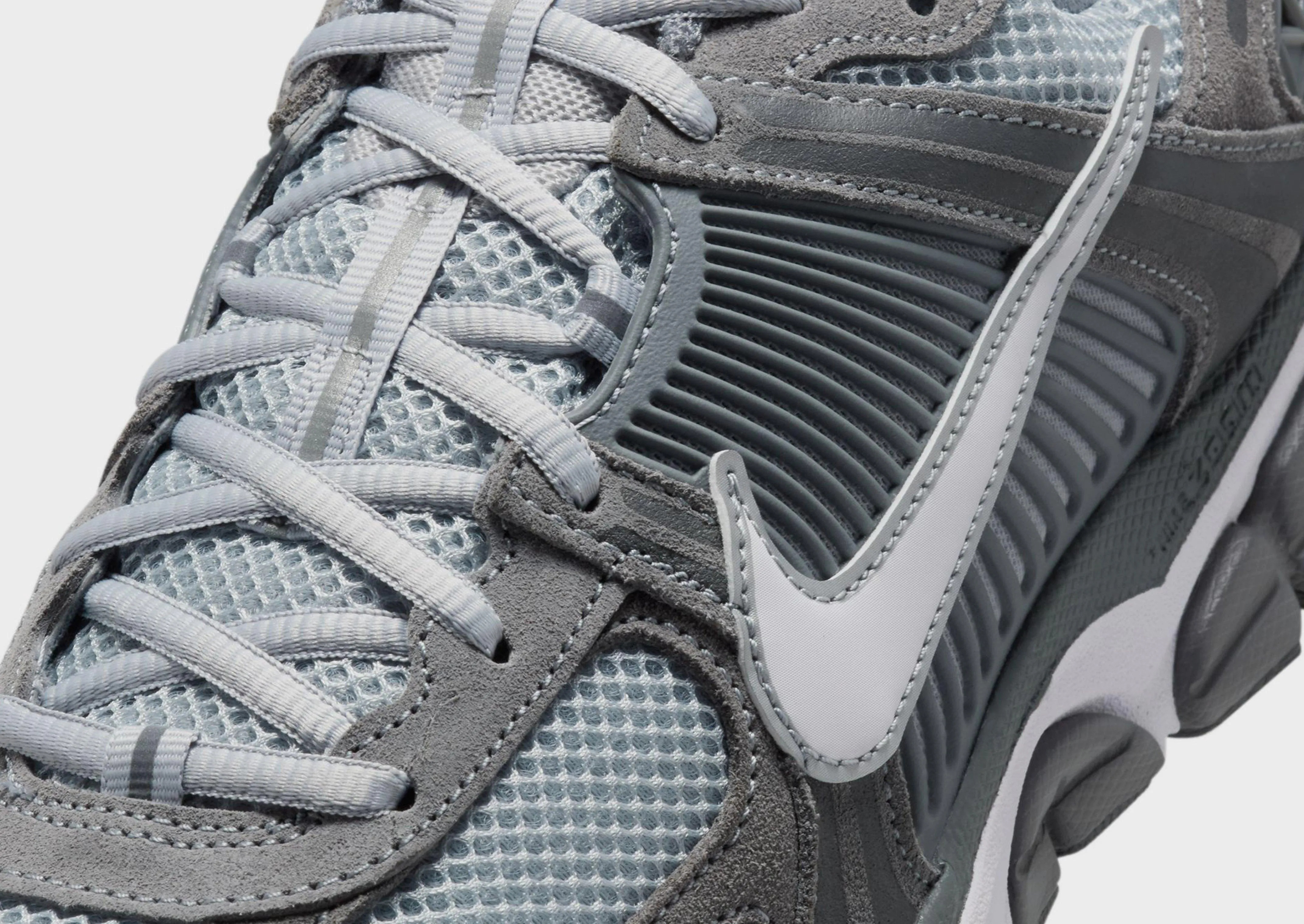 reflective details shoes bone health Zoom Vomero 5