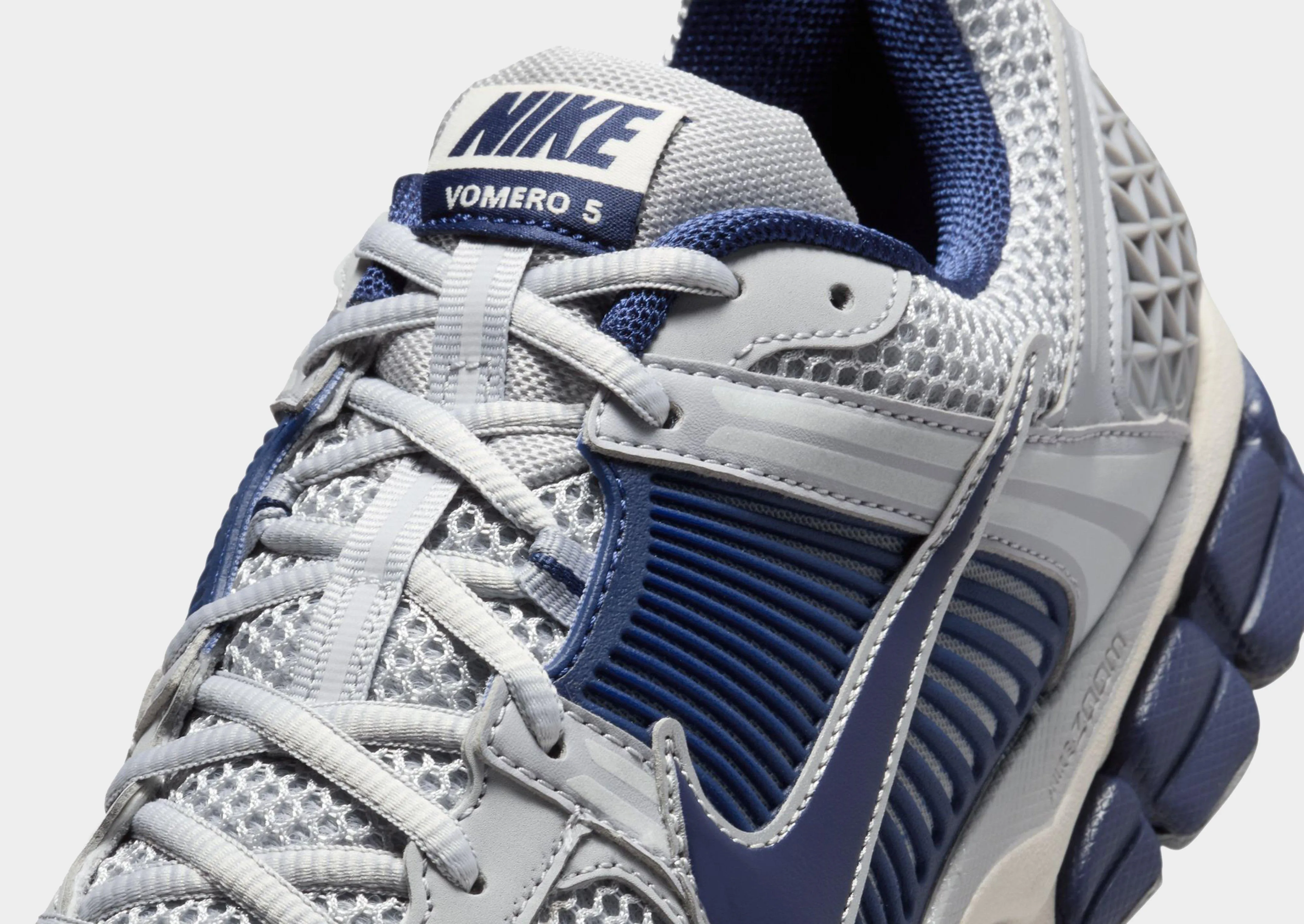 Zoom Vomero 5 running in sand shoes plain shoes